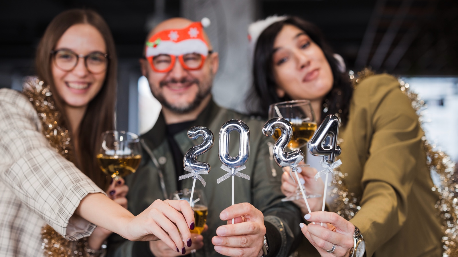 group of happy employees celebrating new year